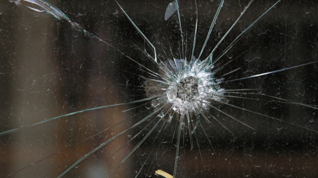 bullet hole in glass