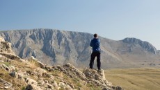 man standing on mountain