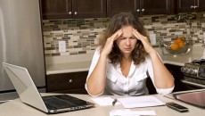 frustrated woman in debt
