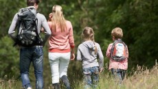 family hiking and in the field