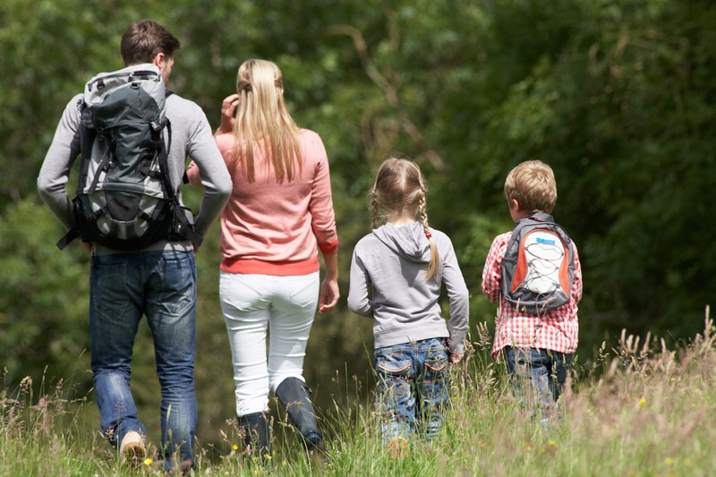 family hiking and in the field