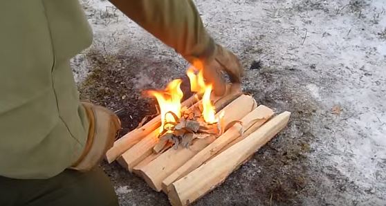 setting up a fire during the winter