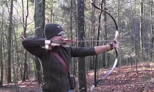 Lilly with a bow and arrow