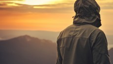 man standing alone outdoors