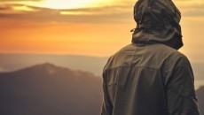 man standing alone outdoors