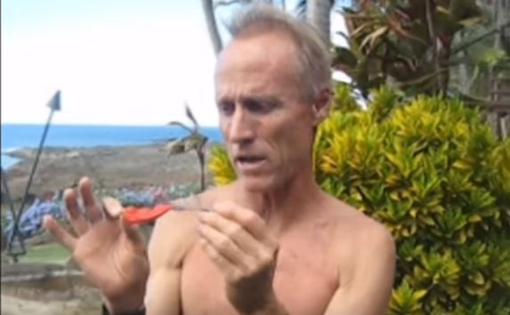 man holding the hottest pepper in the world