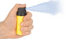 hand with pepper spray