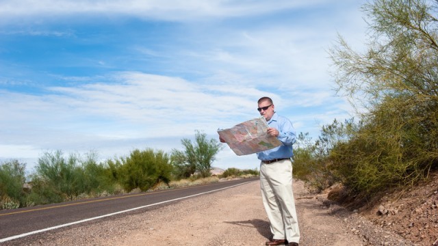 man reading map