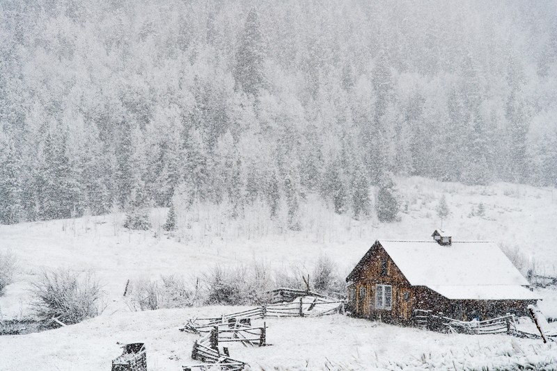 winter cabin snowed in