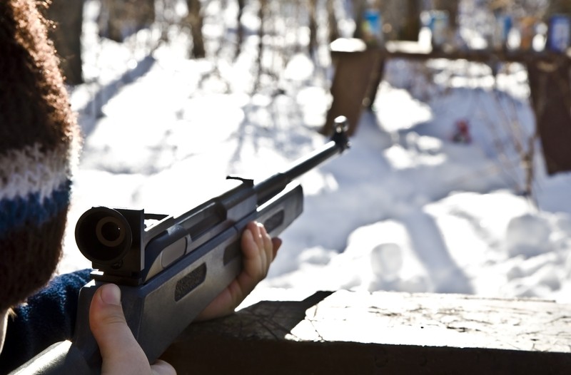 shooting a gun during the winter