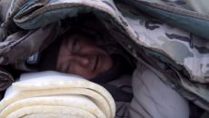 man-surviving-in-blankets