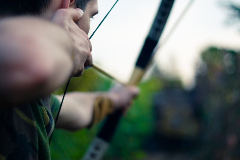 archery man aiming