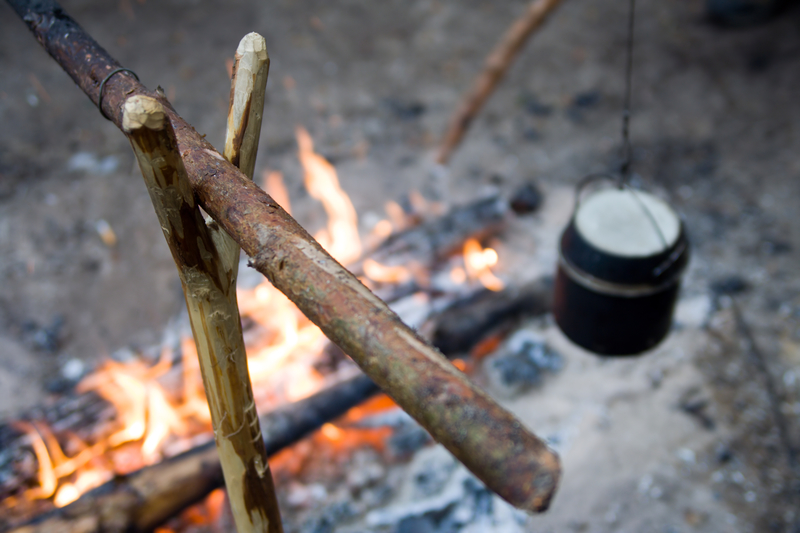 camp fire and pot