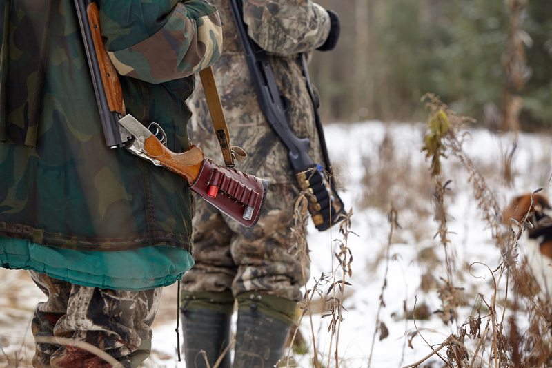 hunter with rifle bushcraft