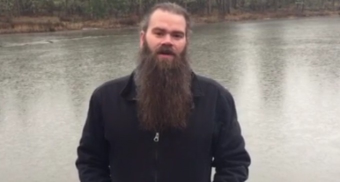 man-in-front-of-pond