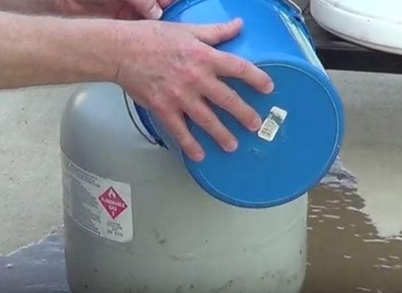 Pouring Water on Propane Tank