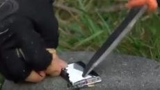 cutting into a battery