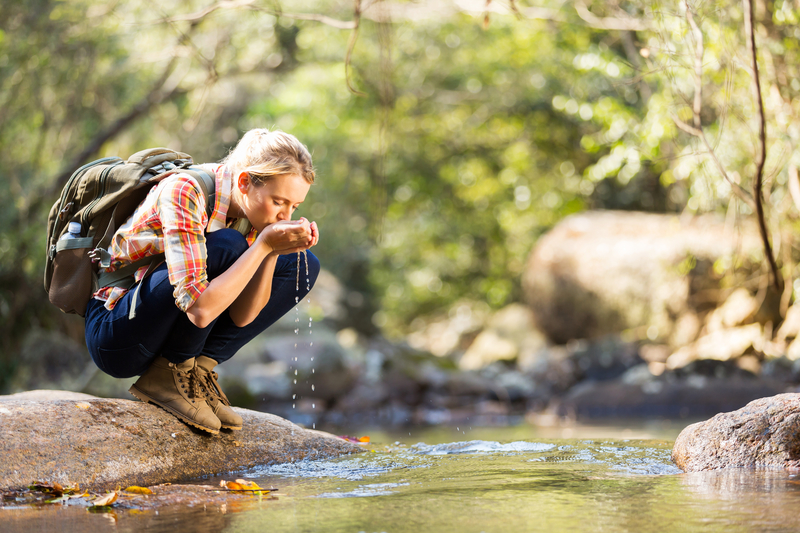 hiker drinking water