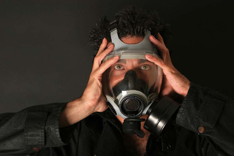 man with gas mask