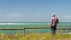 man looking out at sea