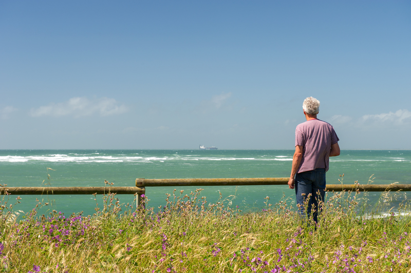 man looking out at sea