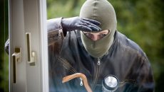 burglar peering through window