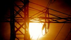 power lines with the sun